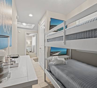 Close-up of the bunk beds showing sturdy design and cozy setup.