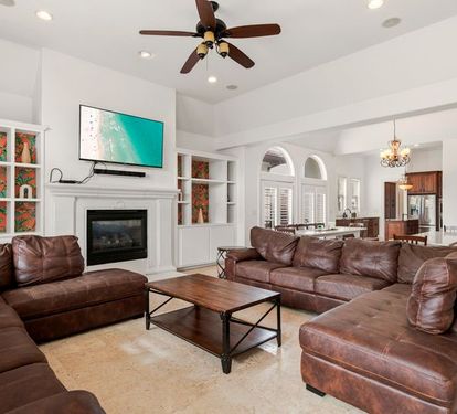Spacious living room featuring a 70" Smart TV
