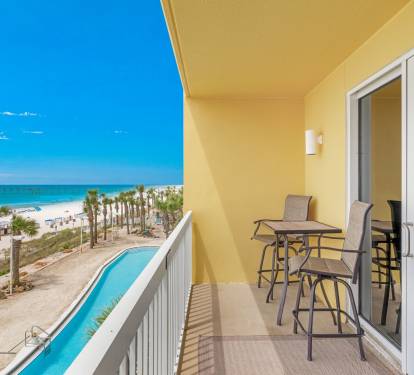 Balcony with hightop chairs for a amazing unobstructed view