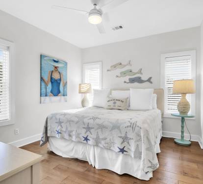 Downstairs bedroom has comfortable king bed and flat screen tv.