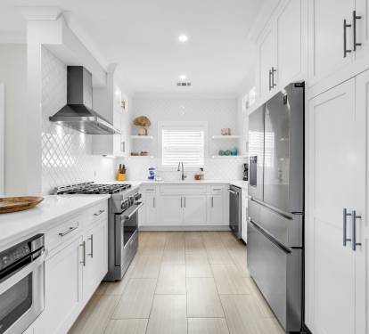 Updated and well stocked kitchen is open to the living area.