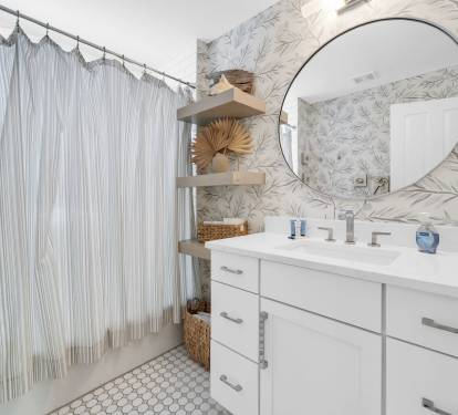 Upstairs bath with full tub/shower combination.