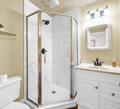 Convenient upstairs hall bath with shower.