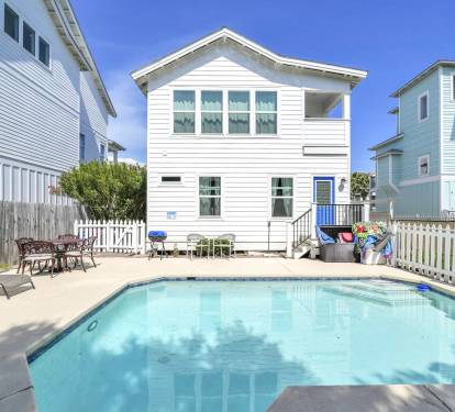 Relax poolside or enjoy a refreshing dip in the private pool.