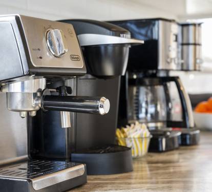 Espresso machine with ESE pods, regular coffee pot, and a Keurig.