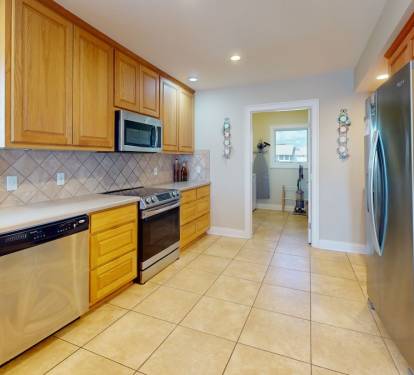 Kitchen with door to laundry room