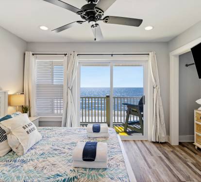 Master bedroom with oceanfront balcony