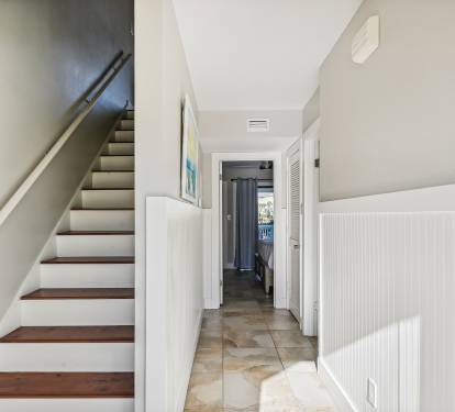 Main level entry to upper level. 2 story townhome