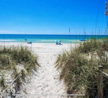 Short walking path to the warm emerald green Gulf waters