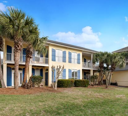  Bimini Breeze exterior with lush landscaping and coastal charm