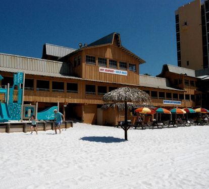 Next door is the Famous Back Porch Restaurant with Beachside Bar.