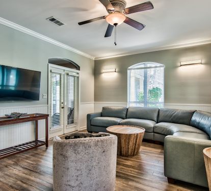 Bright living room with plush seating and Smart TV for family movie nights