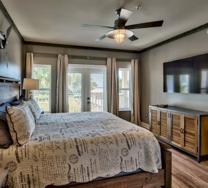 Master King Bedroom with Gulf Views and 65 inch TV