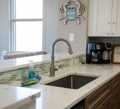 Kohler faucet and extra deep sink