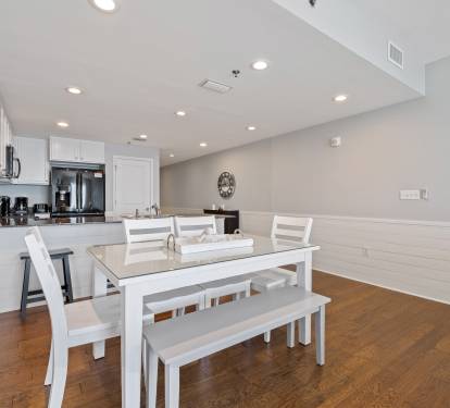 Dining table features 4 chairs, a bench and a glasstop for easy cleanup.