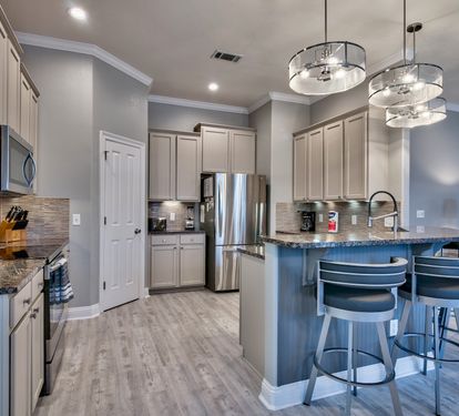 Granite counters and Stainless Steel Appliances and eat-in kitchen