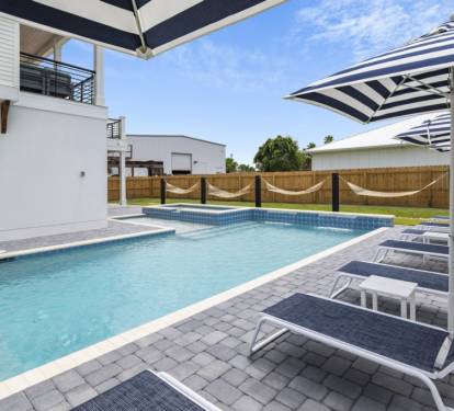Luxury loungers, matching umbrellas, and hammocks.
