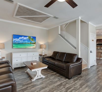 Spacious living area with Smart TV and open layout