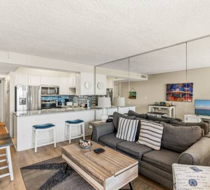 Open-Concept coastal living creates a bright and welcoming gathering space.