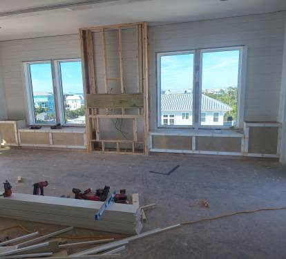 Living Room with built in benches & electric fireplace