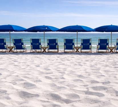 8 beach chairs w/umbrellas daily March thru October