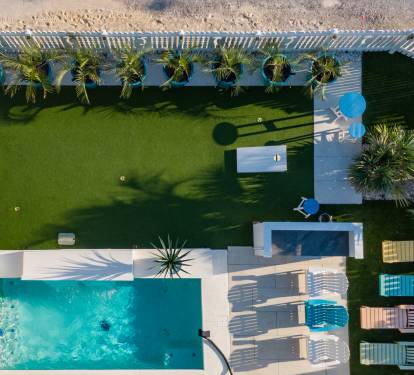 Ariel of the putting and cornhole green. Also our private pool.