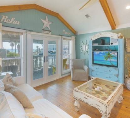 Living room 2 sofas with ocean and beach views
