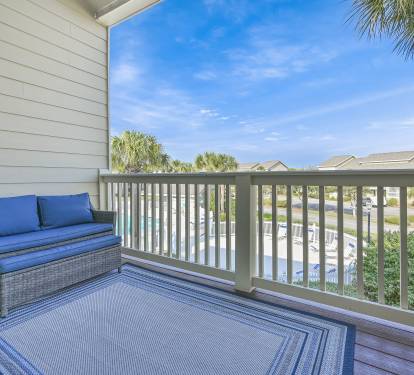 Deck overlooks one of five available pools (heated)