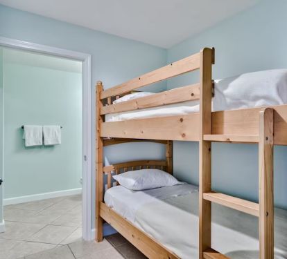 Bunk room with a privacy curtain