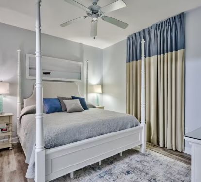 King size bed, black out curtains and luxury vinyl flooring.