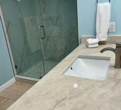 Quartz counter tops in bathroom and kitchen