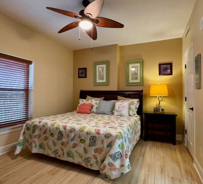 Nicely decorated guest bedroom with King bed