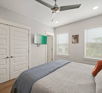 Additional King Suite with natural light and generous closet space.