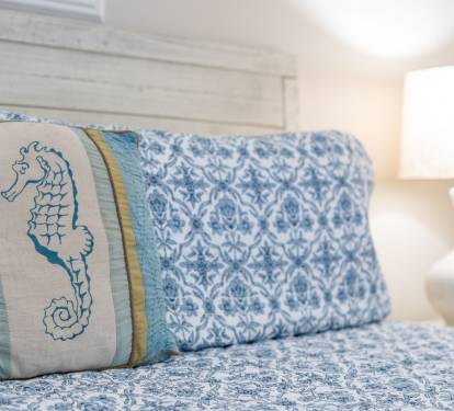 Coastal Bedroom offers a relaxing retreat with soft tomes and cozy comfort.