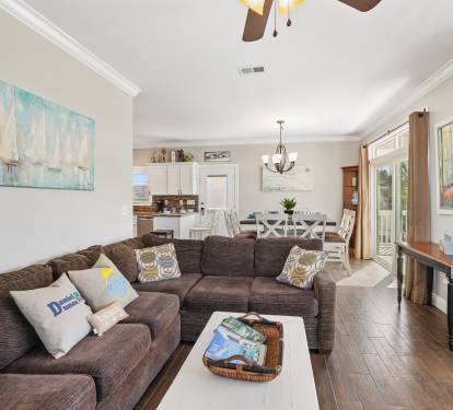 Main Living Area/Eating area. View of gulf while sitting at kitchen table/sofa.