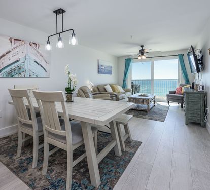 "Dine with a view! This open-concept space effortlessly flows into the living room and balcony, showcasing endless Gulf waters. ????? #OceanfrontDining #CoastalLiving"