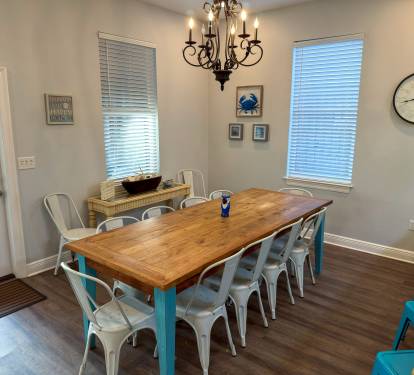 Coastal décor and warm chandelier lighting create a leisurely setting that feels welcoming from the moment you arrive.