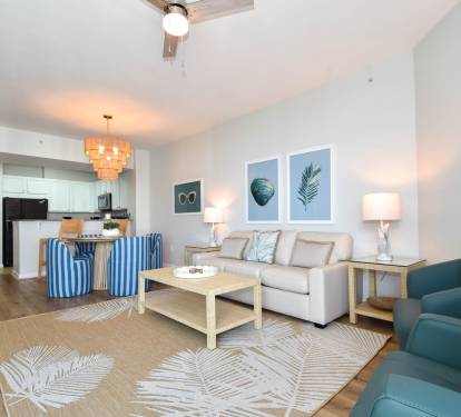 Comfortable living room w/ plush sofa, coastal accents, and space to unwind together.