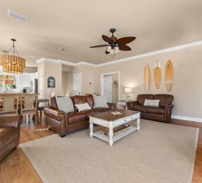 Spacious Living Room Flowing to Kitchen & Porch