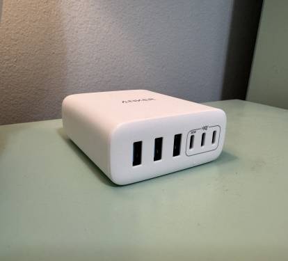 Each bedside table is equipped with an Anker Charging Station.  This charger is a rapid charger that accommodates USB and USBC connections.