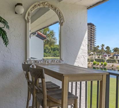Dine al fresco on the balcony overlooking the first hole on the par 3 course. 