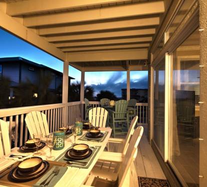 We have 3 large tables on the deck for dining outdoors while taking in the gulf views.