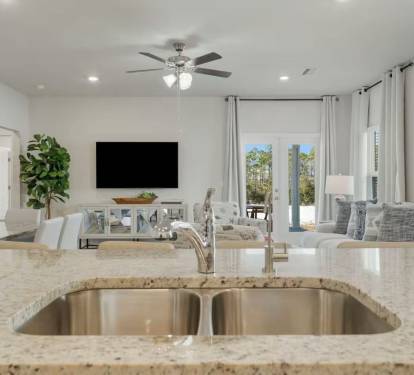 Main Kitchen: Open floor plan. Full kitchen sink with the view of living area