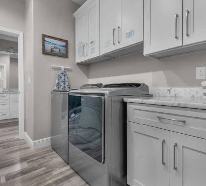 Laundry is a Breeze with Your Full-Size Washer & Dryer & a Spacious Laundry Room