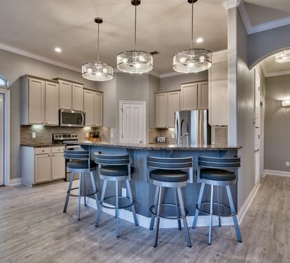 Gourmet eat-in kitchen with breakfast bar