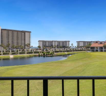 Situated on Hole #1 of the golf course with peek a boo views of the ocean. 