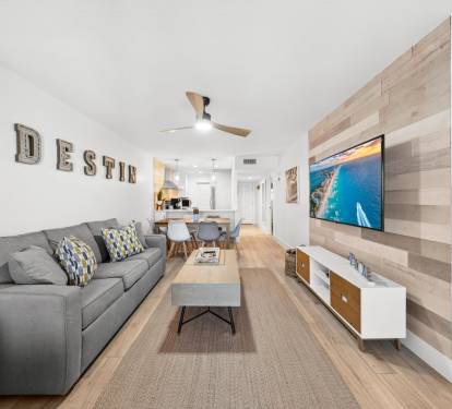 Very clean updated gorgeous living room at our Tradewinds condo in Miramar beach Florida.  
