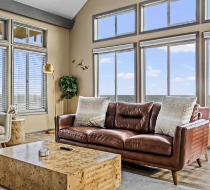 Unforgettable moments await in this spacious living room with panoramic sea views. The eclectic coastal and luxury design, is the perfect space to entertain a large group of friends.
