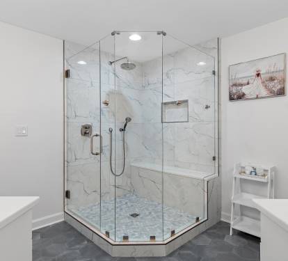 Primary bath with dual sinks and large walk in shower