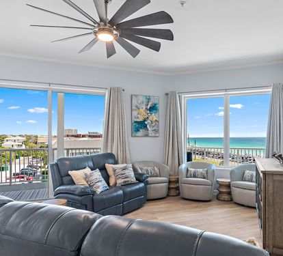 Gulf-view living room with floor-to-ceiling windows